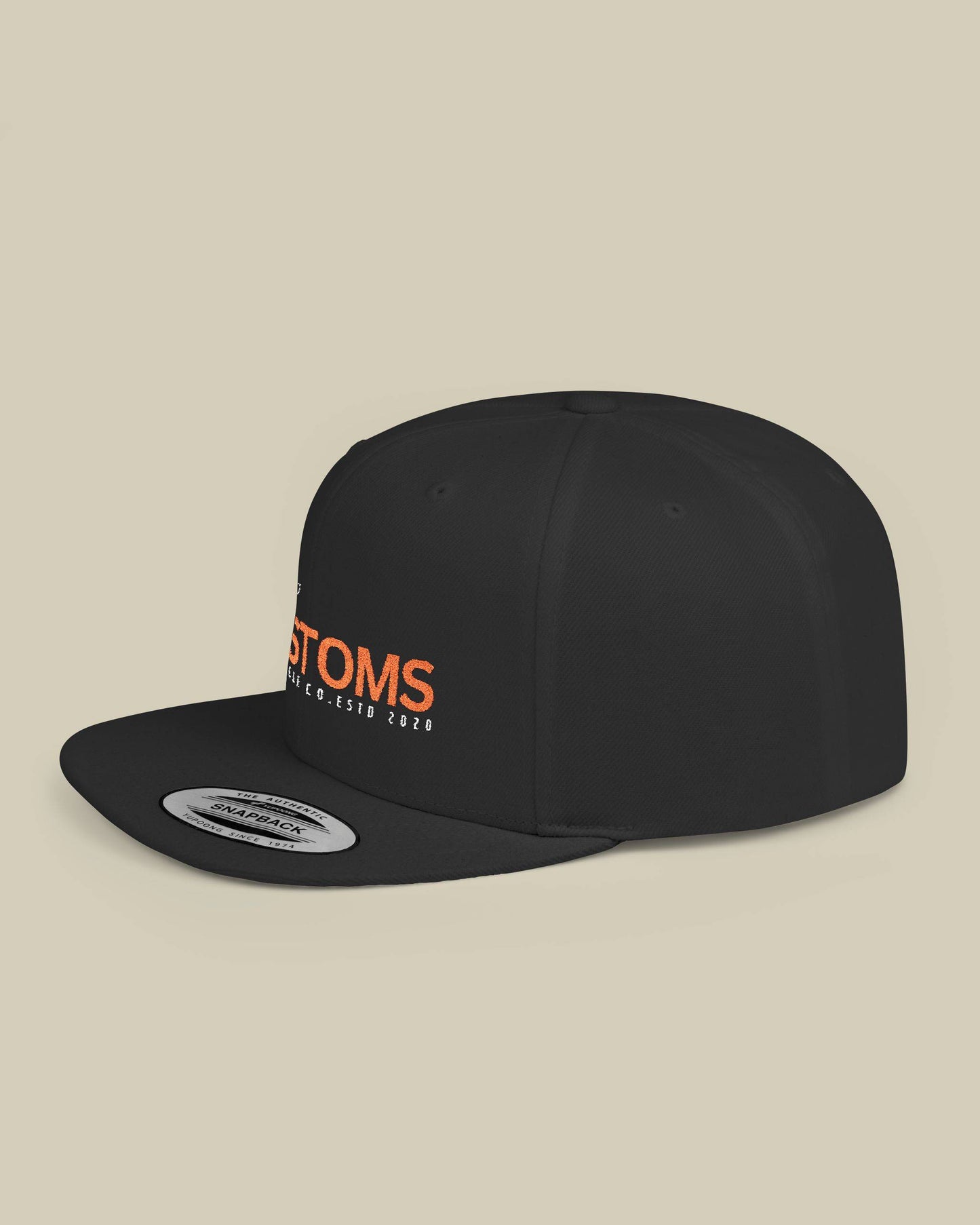 Green cap with 'Ride' and 'Roam' text on a beige background