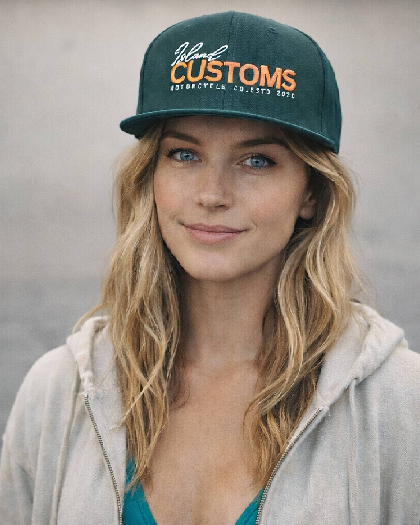 Woman wearing a cap with 'Customs' branding against a neutral background