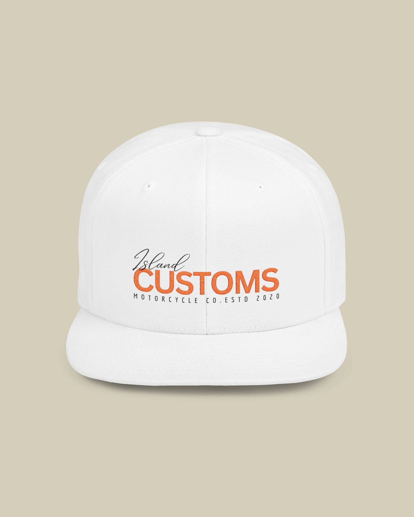 White cap with 'Island Customs' logo on a beige background