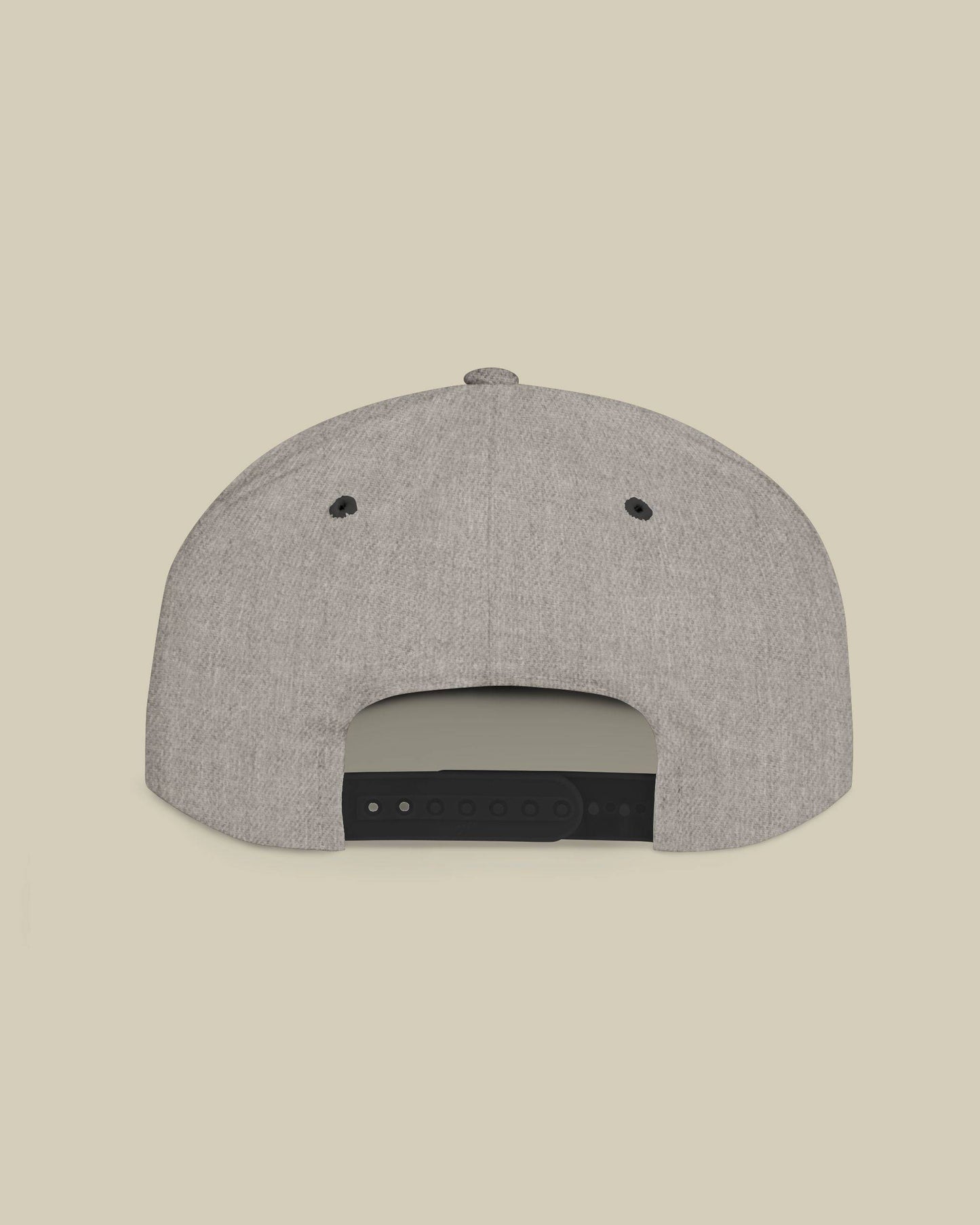 Gray cap with black brim on a beige background
