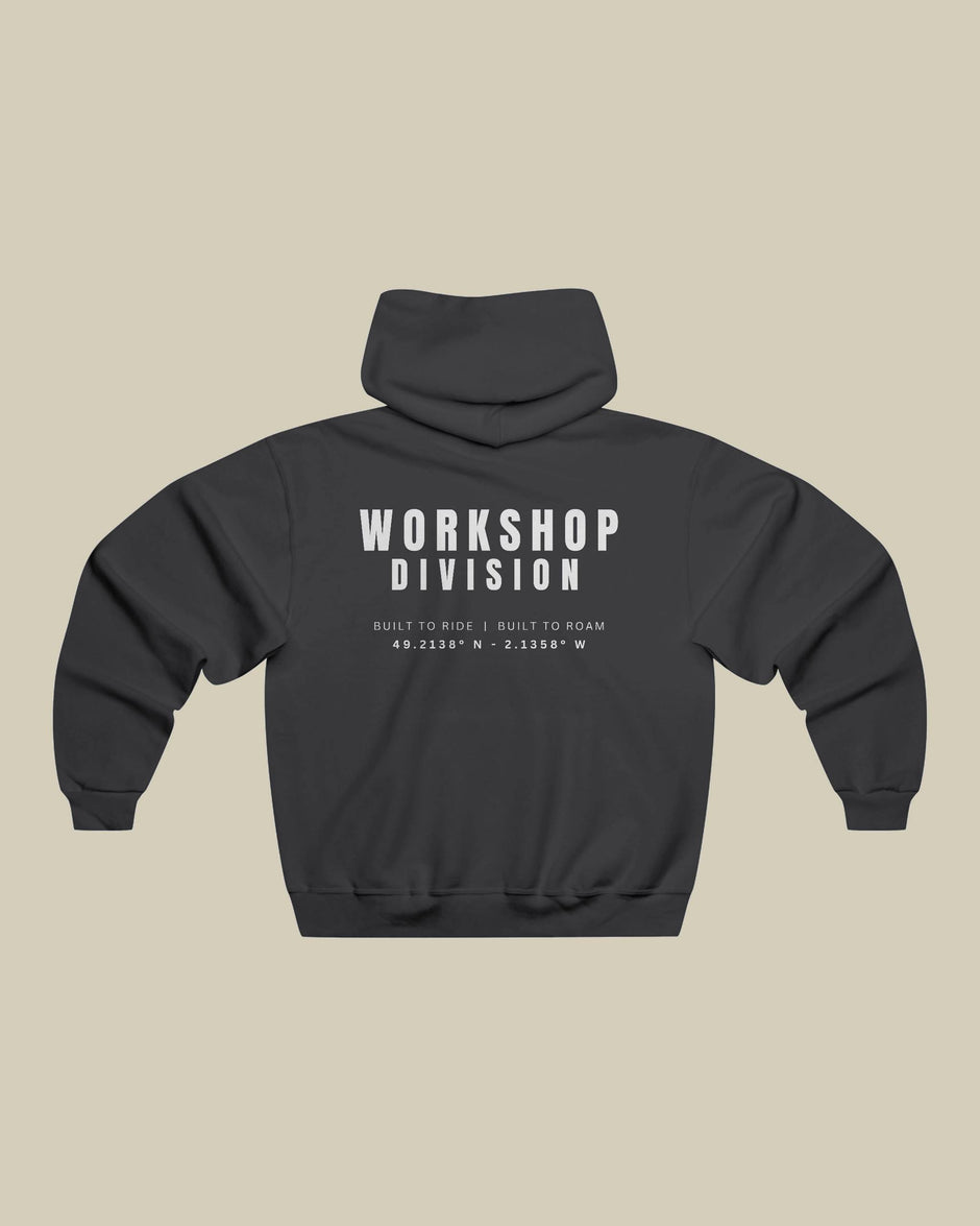 Black hoodie with 'Workshop Division' text on the back against a beige background
