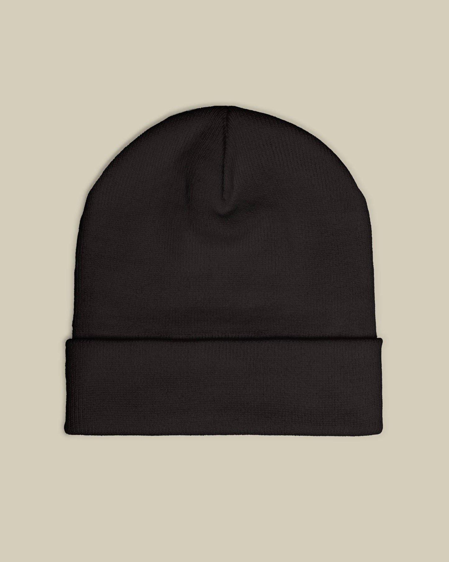Black beanie on a beige background