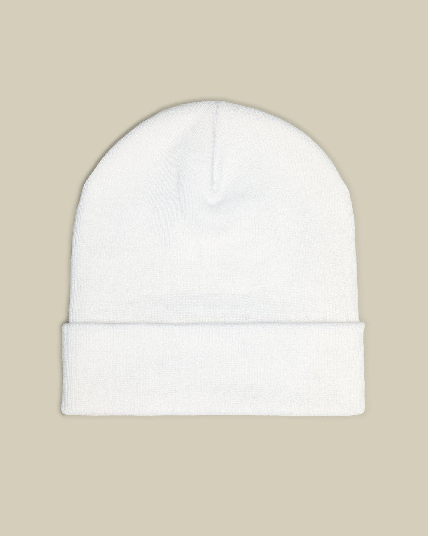 White beanie on a beige background