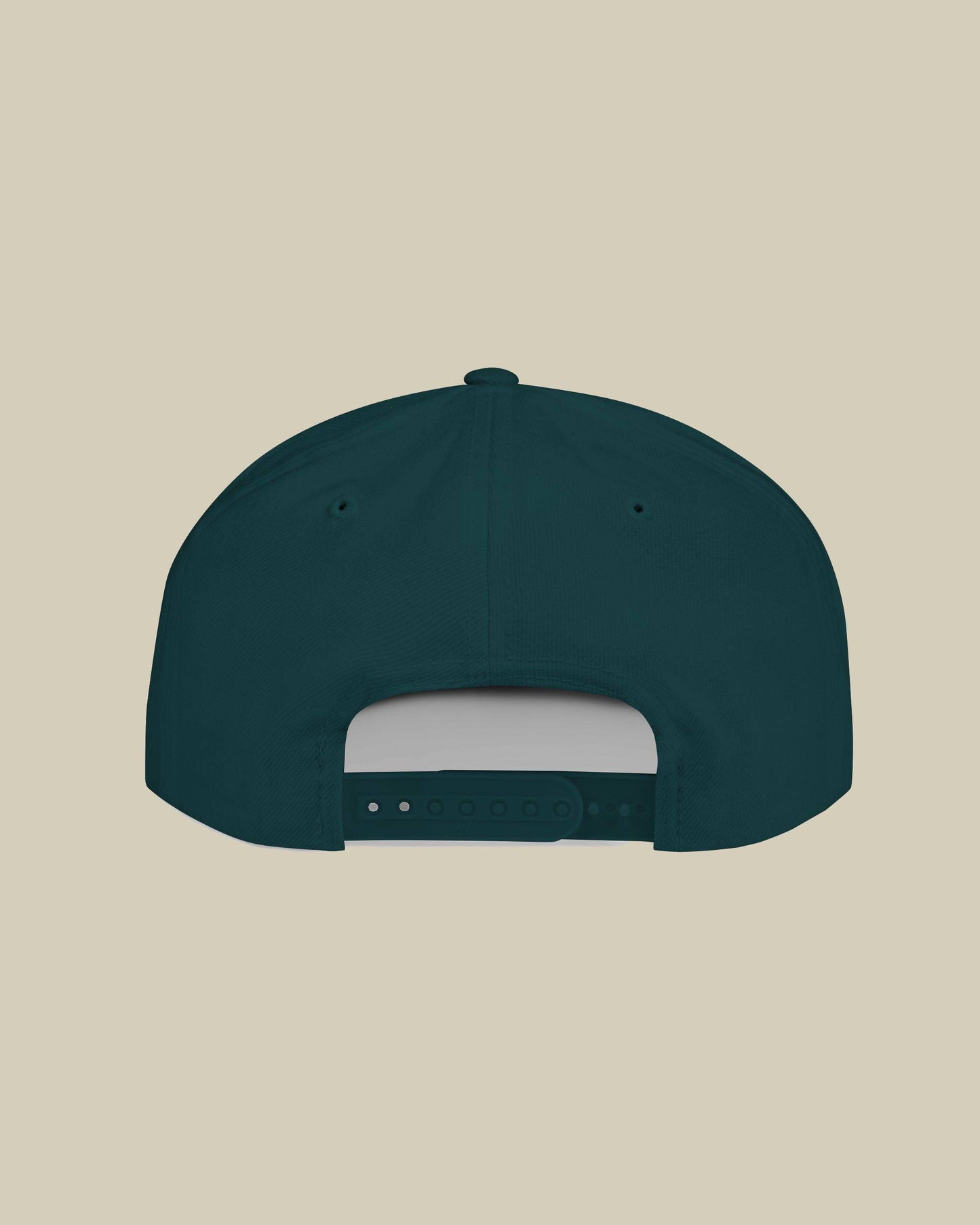 Dark green cap on a beige background