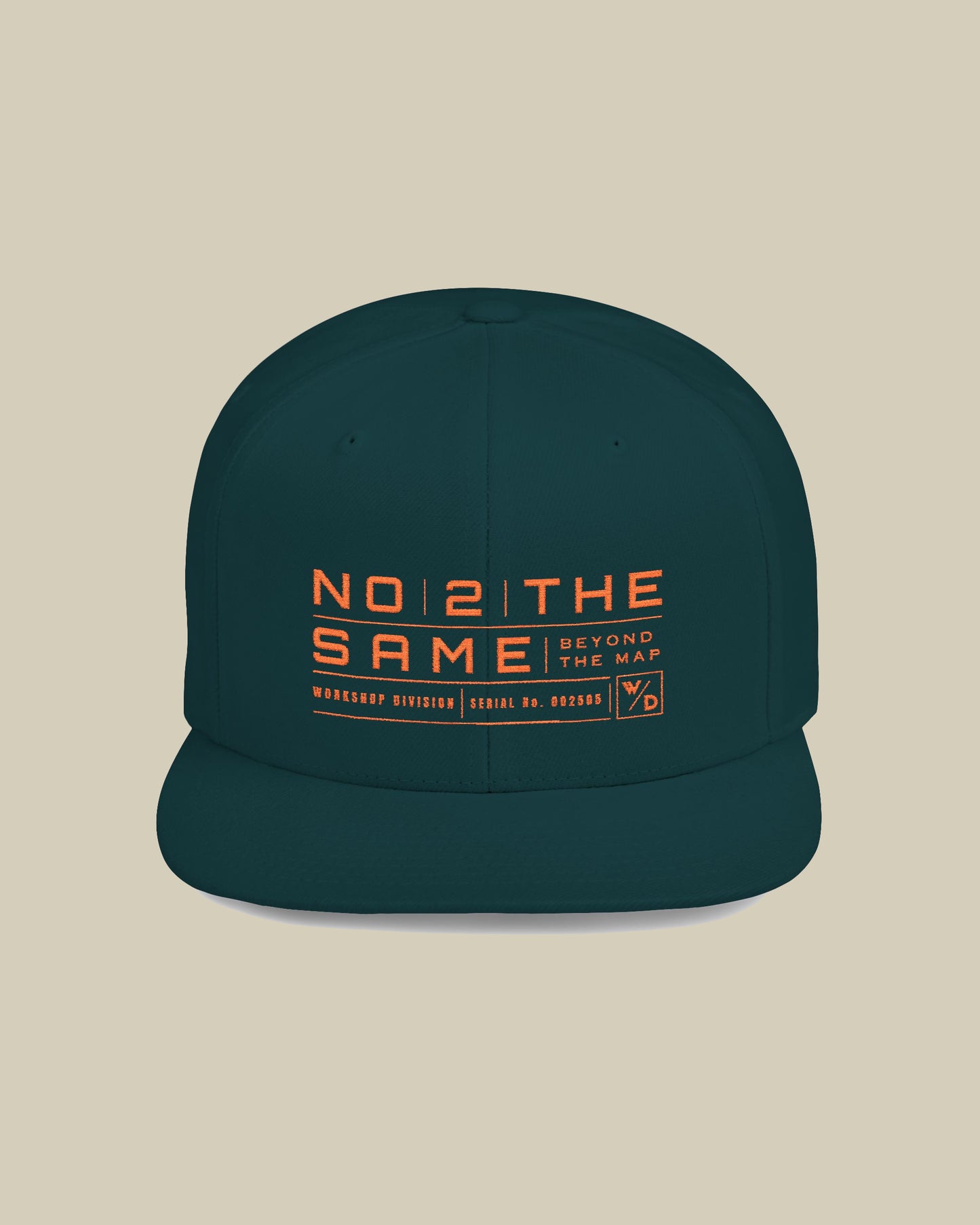 Green cap with orange text on a beige background