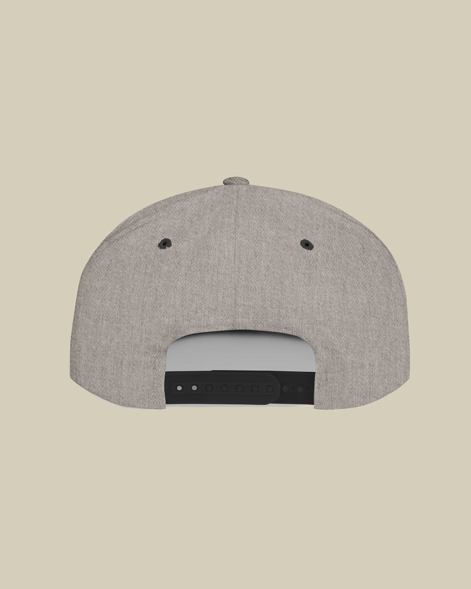 Gray cap with black accents on a beige background