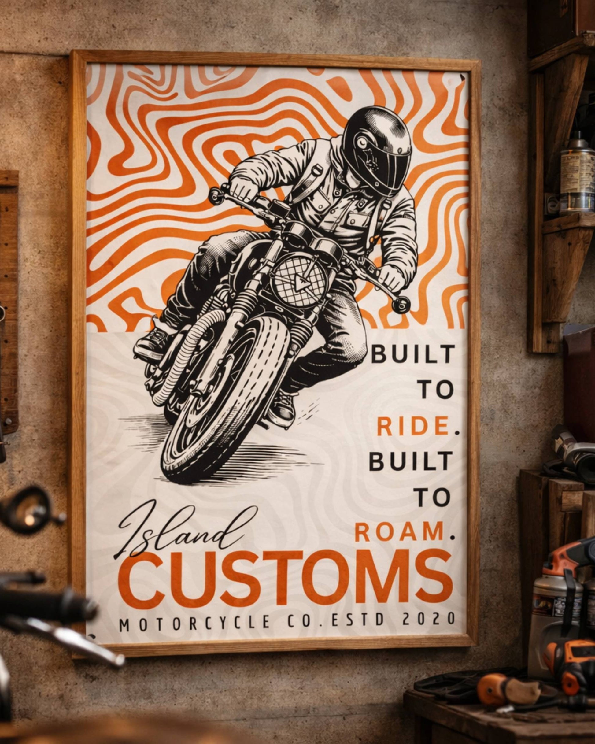 Poster of a person riding a motorcycle with 'Island Customs' branding on a wall.