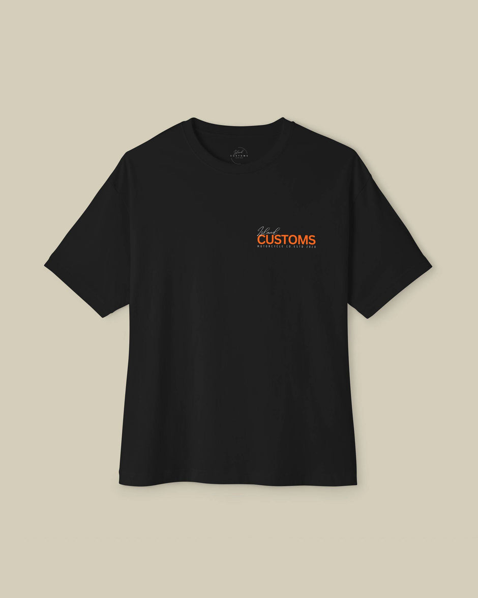 Black t-shirt with orange text on a beige background