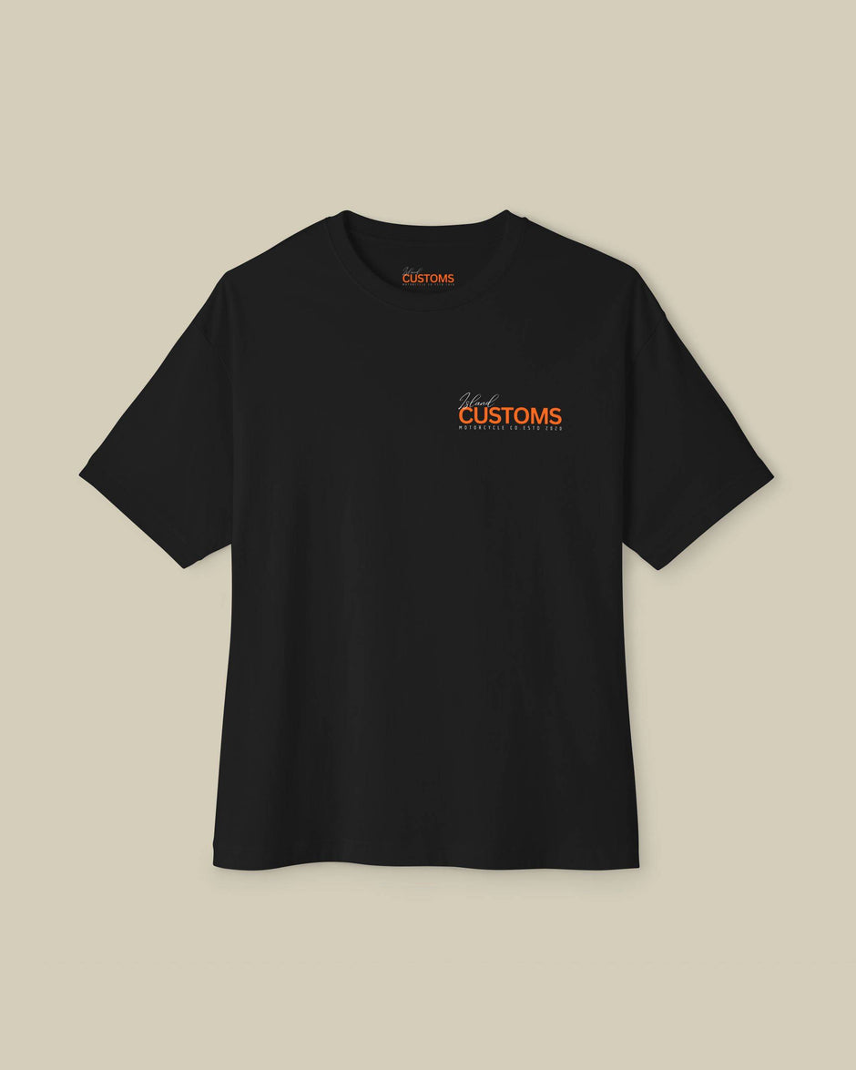 Black t-shirt with orange text on a beige background