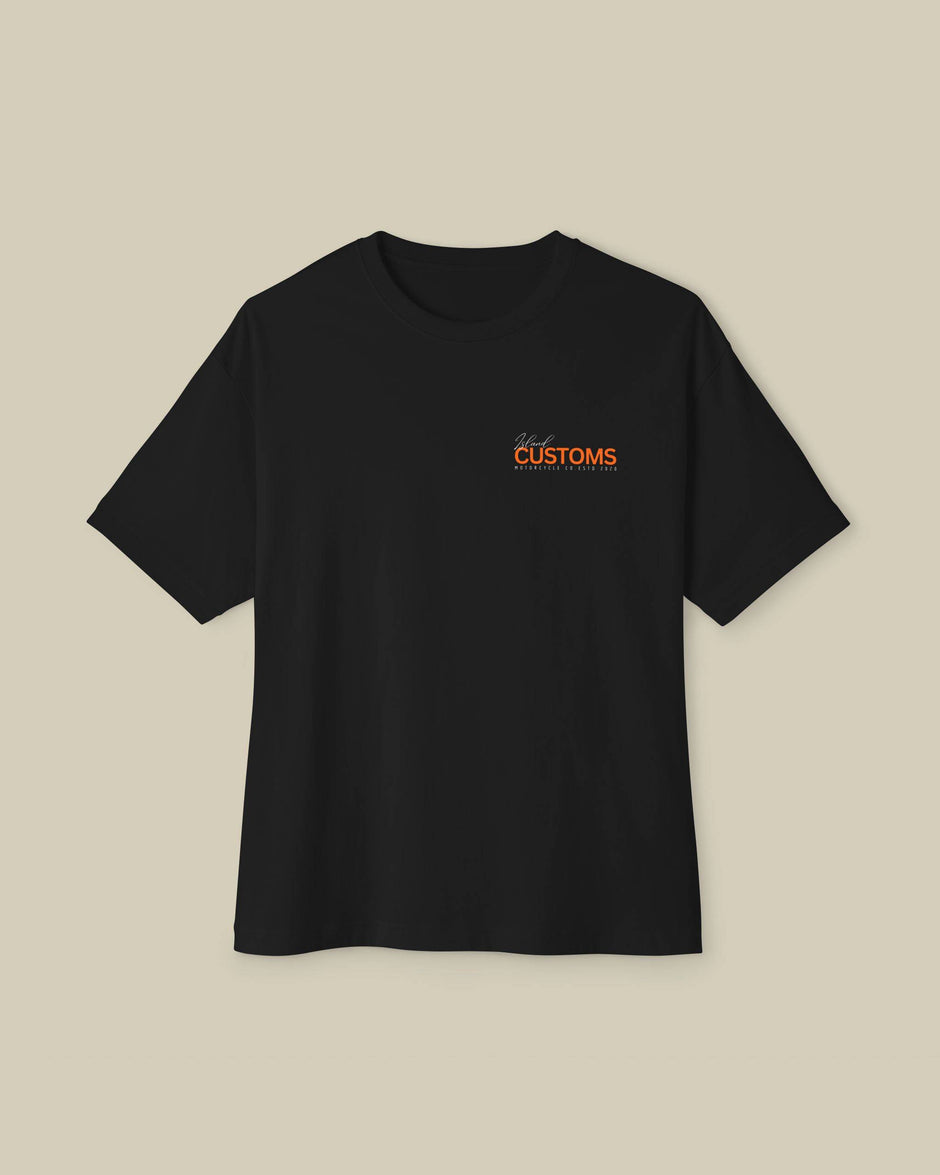Black t-shirt with orange text on a beige background